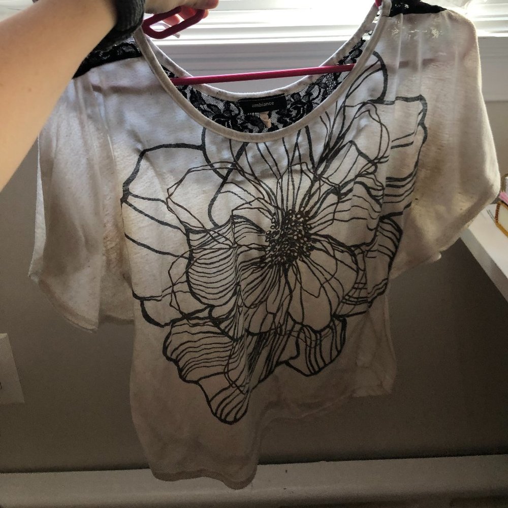 Short Sleeve Top with floral design and black lace design in the back
